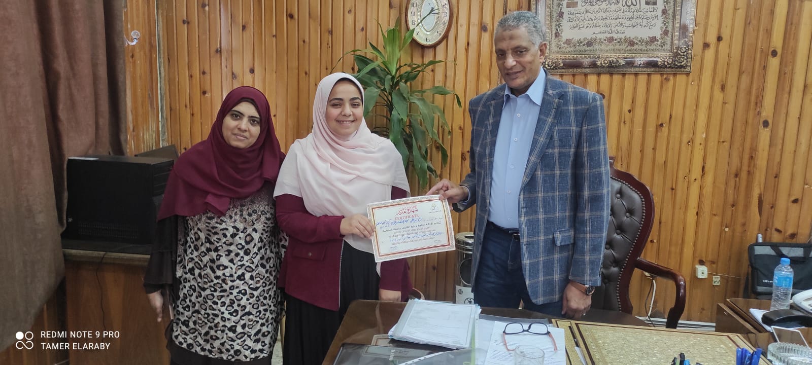 Honoring the student/Israa Al-Sayed Al-Nadi, who won second place equally in religious singing at the Artistic Talents Festival at the university level.