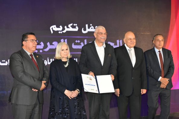 The President of Menoufia University receives a certificate honoring the university for its progress in the Arab classification during the opening of the activities of the International Forum for Higher Education