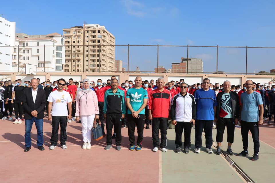 Menoufia University  President leads the team of Physical Education Students to perform the flag salute.